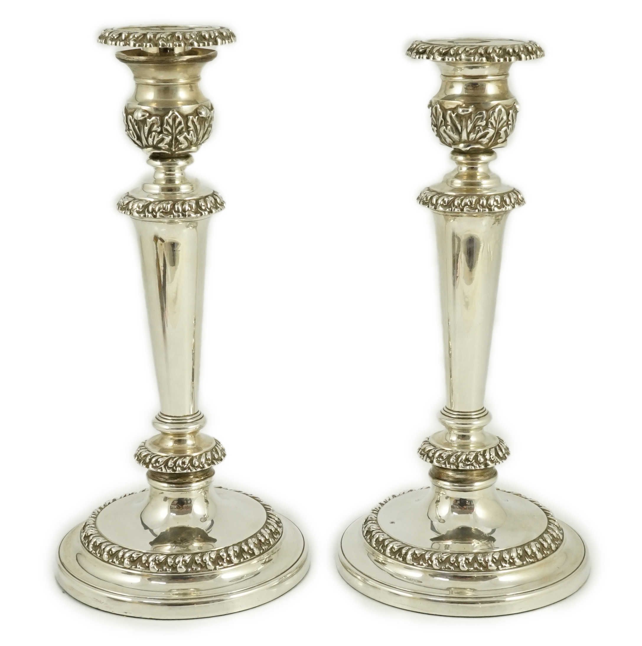 A pair of George III silver candlesticks by John & Thomas Settle